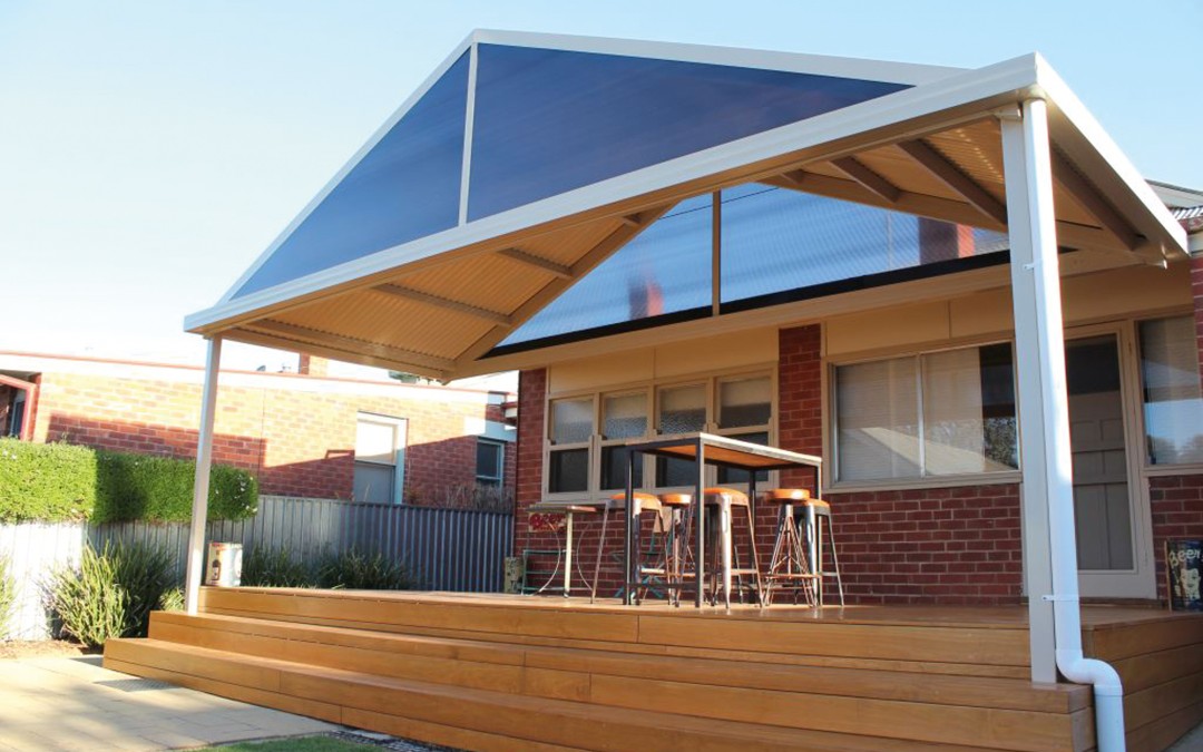 Attached gable roof awning with translucent gable infills and corrugated roof sheets